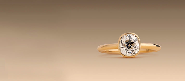 old mine cushion cut diamond engagement ring