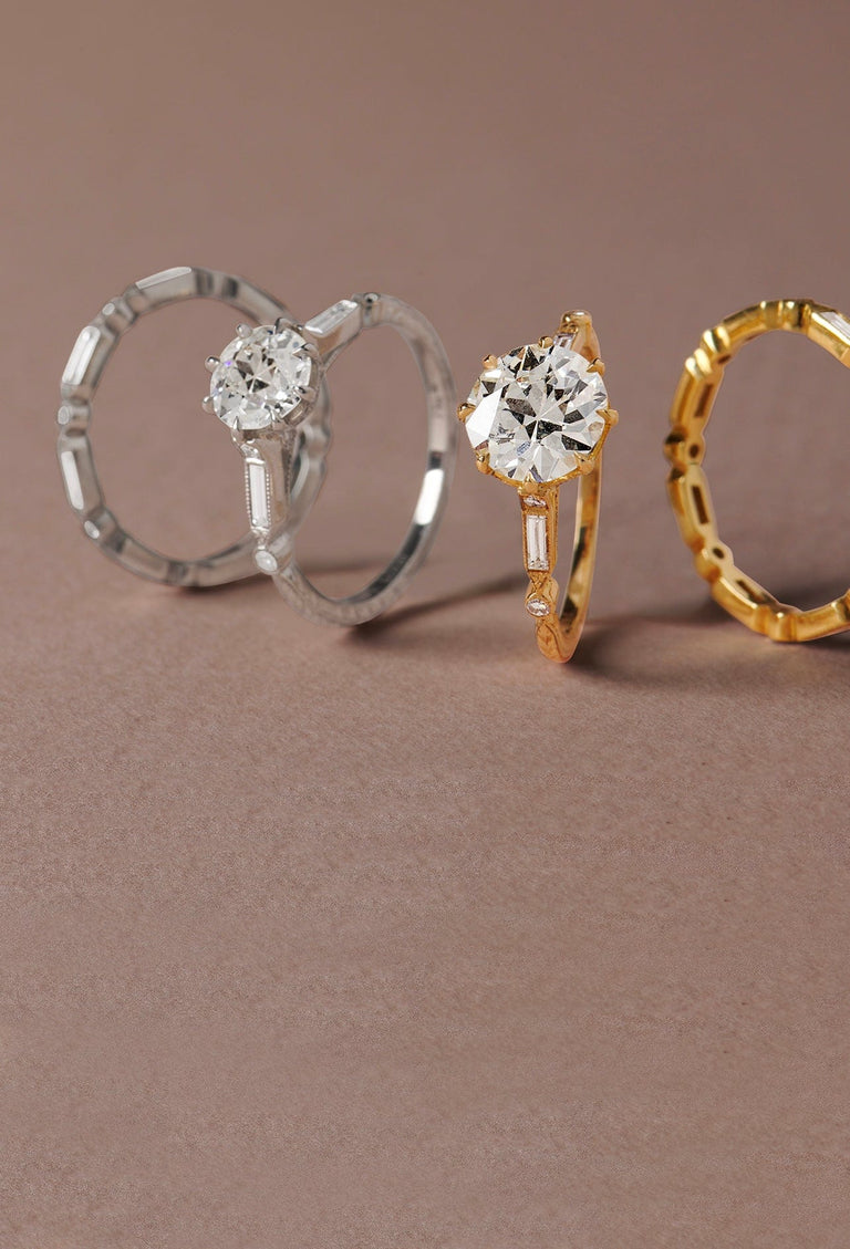 two engagement rings set with antique old European cut diamonds