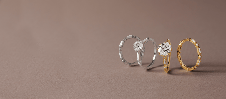 two engagement rings set with antique old European cut diamonds